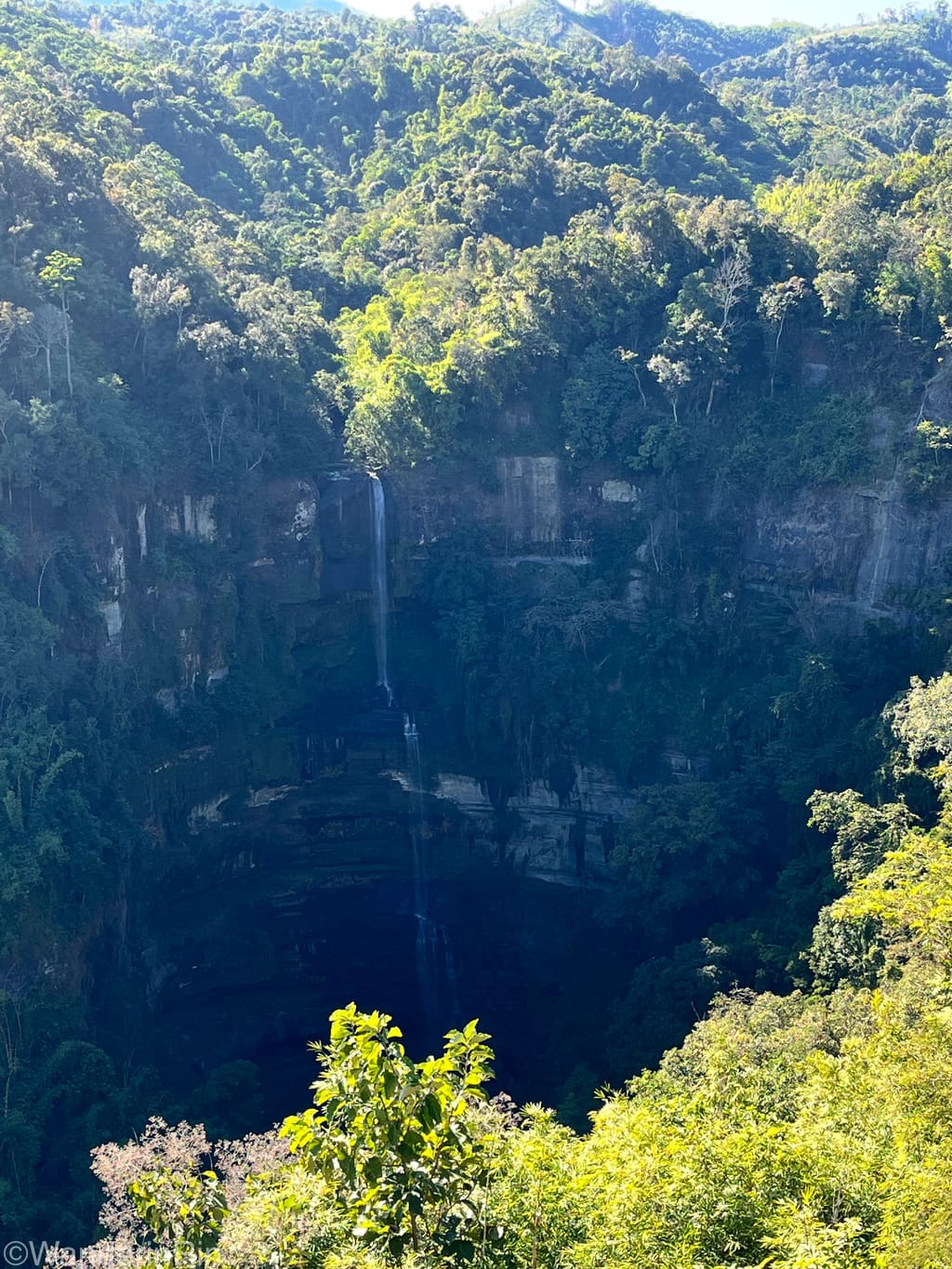 Vantawng Falls plunging through forest near Thenzawl, Mizoram